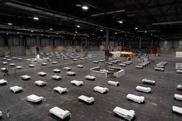 As Spain fights the spread of Covid-19, Madrid's IFEMA conference centre has been repurposed as a temporary hospital, with 5,500 beds.