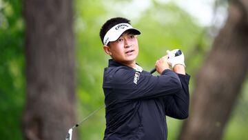 Carl Yuan of China hits his first shot on the 18th hole during the second round of the RBC Canadian Open