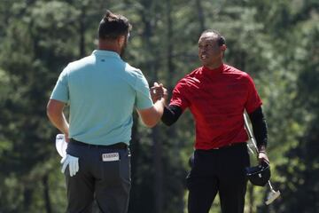 Jon Rahm y Tiger Woods.