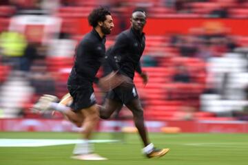 Mohamed Salah and Sadio Mané limber up