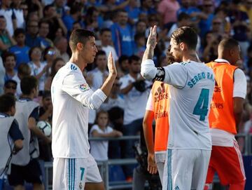 Cristiano Ronaldo celebrates his goal against Getafe with captain Sergio Ramos.