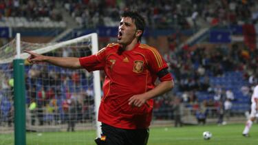 Villa celebra un gol durante su estapa en la Selección española.