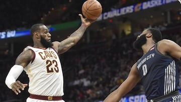 Mar 5, 2018; Cleveland, OH, USA; Cleveland Cavaliers forward LeBron James (23) rebounds beside Detroit Pistons center Andre Drummond (0) in the second quarter at Quicken Loans Arena. Mandatory Credit: David Richard-USA TODAY Sports