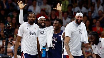 Paris 2024 Olympics - Basketball - Men's Group Phase - Group C - Puerto Rico vs United States - Lille, Pierre Mauroy Stadium, Villeneve-d'Ascq, France - August 03, 2024. Kevin Durant of United States, Lebron James of United States, Anthony Edwards of United States and Anthony Davis of United States celebrate the team's win REUTERS/Evelyn Hockstein