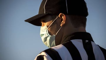 DAVISON, MI - SEPTEMBER 18: An official looks on during the high school football game between Davison and Flint Powers Catholic on September 18, 2020 in Davison, Michigan. High school football restarted this week across most of Michigan despite the corona