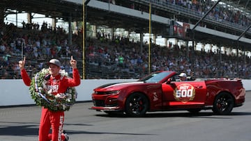 INDIANAPOLIS, INDIANA - MAY 29:  Marcus Ericsson of Sweden, driver of the #5 Chip Ganassi Racing Honda, poses on the finish line yard of bricks after winning the 106th Running of The Indianapolis 500 at Indianapolis Motor Speedway on May 29, 2022 in Indianapolis, Indiana. (Photo by Jamie Squire/Getty Images)