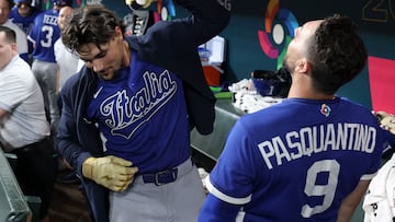 HOUSTON, TEXAS - MARCH 10: Jac Caglianone #14 of Team Italy takes a shot of espresso as he celebrates with teammate Vinnie Pasquantino #9 in the dugout after hitting a solo home run against Team United States in the fourth inning during the 2026 World Baseball Classic at Daikin Park on March 10, 2026 in Houston, Texas. Kenneth Richmond/Getty Images/AFP (Photo by Kenneth Richmond / GETTY IMAGES NORTH AMERICA / Getty Images via AFP)