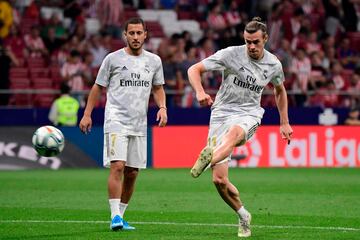 Eden Hazard and Gareth Bale warming up for Real Madrid.