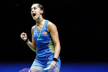 Marín celebrates after defeating Sindhu Pusarla of India in the women's singles final at the World Championships in Nanjing, China.