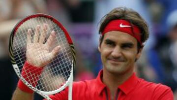 En la imagen, el tenista suizo Roger Federer celebra su victoria en el partido contra el uzbeco Denis Istomin en la cuarta jornada de Tenis de los juegos olímpicos de Londres.