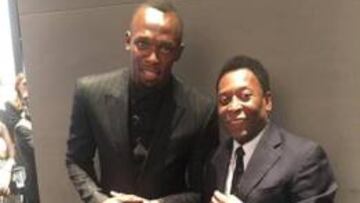 Usain Bolt posa con Pelé después de un acto publicitario en Nueva York.