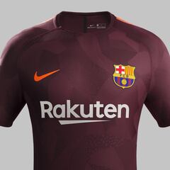 Barcelona launch new third dark maroon kit