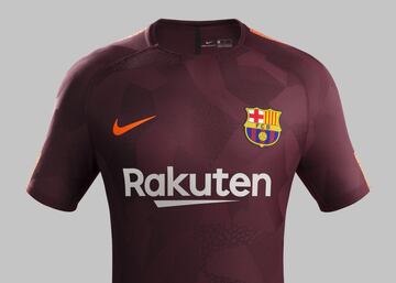 Barcelona launch new third dark maroon kit