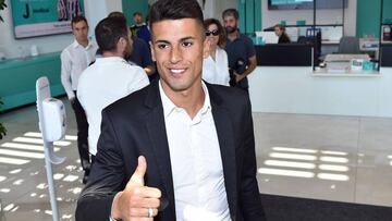 Portuguese player Joao Cancelo gives the thumbs up as he arrives at Juventus Medical center for a medical check up, in Turin, northern Italy, Wednesday, June 27, 2018. (Alessandro Di Marco/ANSA via AP)
