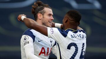 Tottenham Hotspur's Welsh striker Gareth Bale (L) celebrates scoring his team's fourth goal, his second, with Tottenham Hotspur's Ivorian defender Serge Aurier during the English Premier League football match between Tottenham Hotspur and B