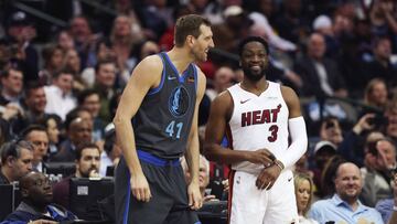 Feb 13, 2019; Dallas, TX, USA; Dallas Mavericks forward Dirk Nowitzki (41) and Miami Heat guard Dwyane Wade (3) laugh while waiting to enter the game during the first quarter at American Airlines Center. Mandatory Credit: Kevin Jairaj-USA TODAY Sports