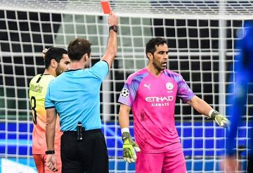 SUB OFF! Belarussian referee Aleksei Kulbakov shows red card to Manchester City's Chilean goalkeeper Claudio Bravo.