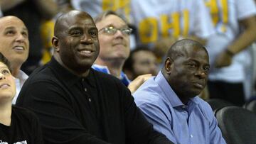 (FILES) This file photo taken on February 8, 2017 shows NBA legend Earvin "Magic" Johnson during the game between the UCLA Bruins and the Oregon Ducks at Pauley Pavilion in Los Angeles, California.
Los Angeles Lakers legend Magic Johnson on February 14, 2017 said he is keen to find a role for Kobe Bryant as he attempts to help revive the flagging NBA franchise's fortunes. The Lakers confirmed earlier this month that Johnson had been hired as an adviser to co-owner and president Jeanie Buss with a wide-ranging brief touching on "all business and basketball matters".Johnson, 57, said that his first move -- if he was given power to do so -- would be to try and recruit the recently retired Bryant into the set-up.
/ AFP PHOTO / GETTY IMAGES NORTH AMERICA / ROBERT LABERGE