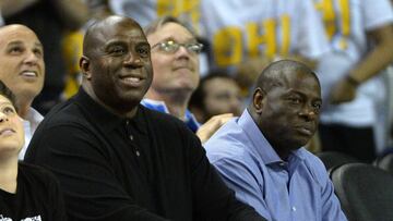 (FILES) This file photo taken on February 8, 2017 shows NBA legend Earvin &quot;Magic&quot; Johnson during the game between the UCLA Bruins and the Oregon Ducks at Pauley Pavilion in Los Angeles, California.  
 Los Angeles Lakers legend Magic Johnson on February 14, 2017 said he is keen to find a role for Kobe Bryant as he attempts to help revive the flagging NBA franchise&#039;s fortunes. The Lakers confirmed earlier this month that Johnson had been hired as an adviser to co-owner and president Jeanie Buss with a wide-ranging brief touching on &quot;all business and basketball matters&quot;.Johnson, 57, said that his first move -- if he was given power to do so -- would be to try and recruit the recently retired Bryant into the set-up.
  / AFP PHOTO / GETTY IMAGES NORTH AMERICA / ROBERT LABERGE