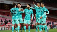 LONDON, ENGLAND - APRIL 03: Diogo Jota of Liverpool celebrates with Trent Alexander-Arnold, Mohamed Salah and teammates after scoring their team&#039;s first goal during the Premier League match between Arsenal and Liverpool at Emirates Stadium on April 0