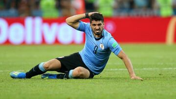 Suarez hurt in Uruguay training as Cavani sits out team session