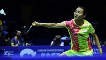 Wang Yihan hits a return against Beatriz Corrales of Spain 