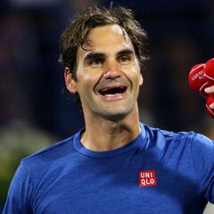 Federer claims 100th singles title with victory in Dubai