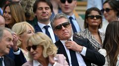 Sientan a Hugh Grant detrás de la Reina en Wimbledon y lo que hace lo perseguirá de por vida