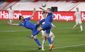 Georgios Tzavelas, Älvaro Morata y Kyriakos Papadopoulos.