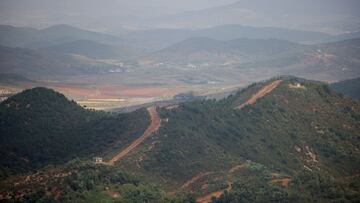 FILE PHOTO: A general view of the North Korean guard posts, in this picture taken from the top of the Aegibong Peak Observatory, south of the demilitarised zone (DMZ), separating the two Koreas in Gimpo, South Korea, October 5, 2021. REUTERS/Kim Hong-Ji/File Photo