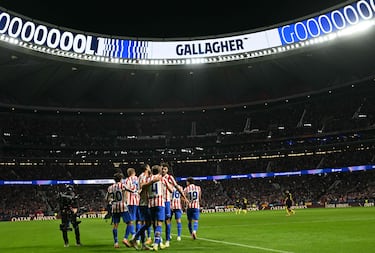 Atletico Madrid's English midfielder #04 Conor Gallagher celebrates scoring his team's second goal with teammates during the UEFA Champions League league phase day 4 football match between Club Atletico de Madrid and Union St-Gilloise at the Metropolitano Stadium in Madrid on November 4, 2025. (Photo by Javier SORIANO / AFP)