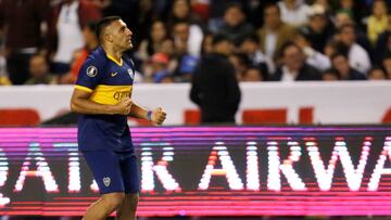 Soccer Football - Copa Libertadores - Quarter Final - First Leg - LDU Quito v Boca Juniors - Liga Universitaria Stadium, Quito, Ecuador - August 21, 2019  Boca Juniors&#039; Ramon Abila celebrates their third goal scored by Liga de Quito&#039;s Luis Caicedo REUTERS/Daniel Tapia