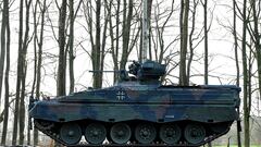 A marder fighting vehicle is loaded on a train before travelling to Hohenfels in Bavaria to take part in a 1st tank division exercise during "Allied Spirit 24", in Hagenow, Germany, February 20, 2024. REUTERS/Fabian Bimmer