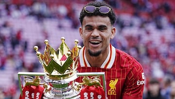 Liverpool's Luis Diaz celebrates with the Premier League trophy after the Premier League match at Anfield, Liverpool. Picture date: Sunday May 25, 2025. (Photo by Peter Byrne/PA Images via Getty Images)