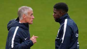 Deschamps junto a Umtiti.