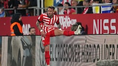 GIRONA, SPAIN - MARCH 13: Aleix Garcia of Girona FC stretches following injury during the LaLiga Santander match between Girona FC and Atletico de Madrid at Montilivi Stadium on March 13, 2023 in Girona, Spain. (Photo by Alex Caparros/Getty Images)