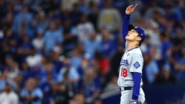 TORONTO, ONTARIO - OCTOBER 25: Yoshinobu Yamamoto #18 of the Los Angeles Dodgers reacts to a pop fly for the third out to defeat the Toronto Blue Jays 5-1 in game two of the 2025 World Series at Rogers Center on October 25, 2025 in Toronto, Ontario. Vaughn Ridley/Getty Images/AFP (Photo by Vaughn Ridley / GETTY IMAGES NORTH AMERICA / Getty Images via AFP)