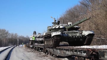 This handout video grab released by the Russian Defence Ministry on February 17, 2022, shows Russian tanks leaving for Russia after joint exercises of the armed forces of Russia and Belarus as part of an inspection of the Union State's Response Force