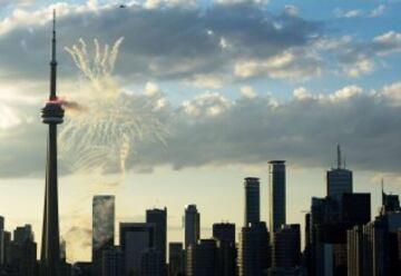 Fireworks shoot off from the CN Tower during the opening ceremony for the 2015 Pan American Games in Toronto, Ontario on July 10, 2015.      AFP PHOTO/ JIM WATSON