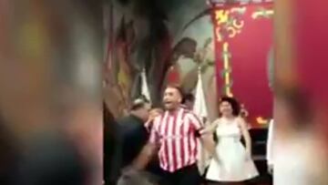 Supporter wears Athletic Club home shirt for his wedding