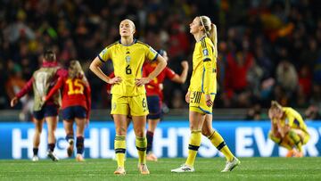 Soccer Football - FIFA Women’s World Cup Australia and New Zealand 2023 - Semi Final - Spain v Sweden - Eden Park, Auckland, New Zealand - August 15, 2023
Sweden's Magdalena Eriksson and Amanda Ilestedt look dejected after the match as Sweden are knocked out of the World Cup REUTERS/Molly Darlington     TPX IMAGES OF THE DAY     