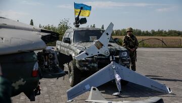 Destroyed Russian drones are seen as a member of the mobile air defence groups attends a handover ceremony of pick up trucks with DShK machine guns donated by a volunteer group, amid Russia's attack on Ukraine, near the town of Borispil, Kyiv region, Ukraine May 10, 2023. REUTERS/Gleb Garanich
