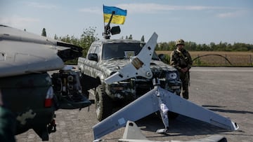 Destroyed Russian drones are seen as a member of the mobile air defence groups attends a handover ceremony of pick up trucks with DShK machine guns donated by a volunteer group, amid Russia's attack on Ukraine, near the town of Borispil, Kyiv region, Ukraine May 10, 2023. REUTERS/Gleb Garanich