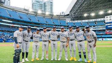 Rene Pinto #50, Yandy Diaz #2, Wander Franco #5, Isaac Paredes #17, David Peralta #6, Harold Ramirez #43, Jose Siri #22, Manuel Margot #13, and Randy Arozarena #56 of the Tampa Bay Rays pose after playing in the first all-Latino lineup in MLB history.