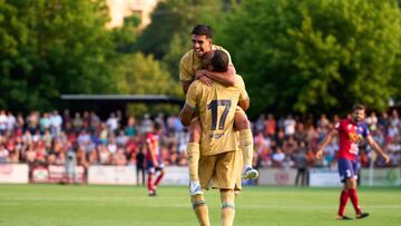 OLOT, SPAIN - JULY 13: Pierre-Emerick Aubameyang of FC Barcelona celebrates with his teammate Ilias Akhomach after scoring their team's first goal during the pre-season friendly match between UE Olot and FC Barcelona at Nou Estadi Municipal on July 13, 2022 in Olot, Spain. (Photo by Alex Caparros/Getty Images)