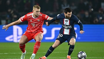 Paris Saint-Germain's Argentine forward Lionel Messi (R) fights for the ball with Bayern Munich's German midfielder Joshua Kimmich during the UEFA Champions League football match between Paris Saint-Germain (PSG) and Bayern Munich (FC Bayern Muenchen) at the Parc des Princes in Paris, on February 14, 2023. (Photo by Anne-Christine POUJOULAT / AFP)