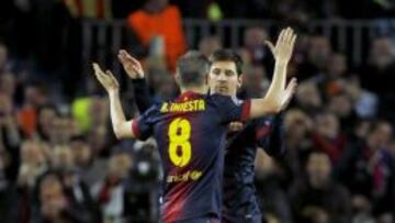 Andrés Iniesta y Leo Messi