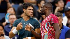NEW YORK, NEW YORK - AUGUST 23: Carlos Alcaraz of Spain (L) reacts with Frances Tiafoe of the United States (R) during the Stars of the Open Exhibition Match to Benefit Ukraine Relief prior to the 2023 US Open at USTA Billie Jean King National Tennis Center on August 23, 2023 in New York City.   Sarah Stier/Getty Images/AFP (Photo by Sarah Stier / GETTY IMAGES NORTH AMERICA / Getty Images via AFP)