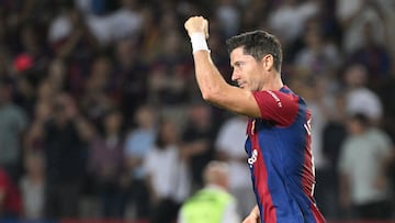 Barcelona's Polish forward #09 Robert Lewandowski celebrates after scoring his team's second goal during the Spanish Liga football match between FC Barcelona and Real Betis at the Estadi Olimpic Lluis Companys in Barcelona on September 16, 2023. (Photo by Josep LAGO / AFP)