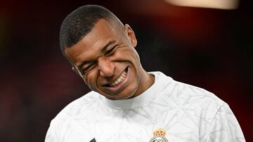 Real Madrid's French forward #09 Kylian Mbappe reacts during the warm up ahead of the UEFA Champions League football match between Liverpool and Real Madrid at Anfield in Liverpool, north west England on November 27, 2024. (Photo by Oli SCARFF / AFP)